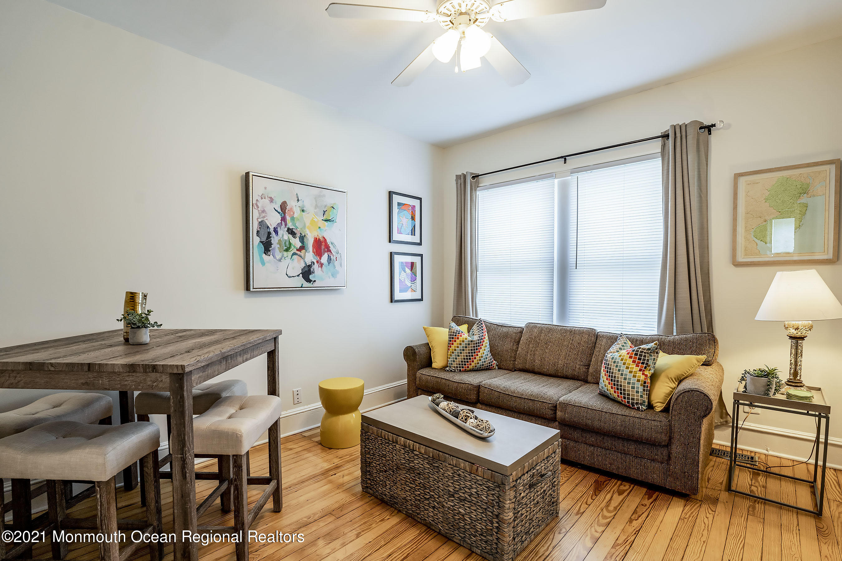 132 Sampson Place Long Branch, NJ 07740 - Photo 9 of 21 a living room with furniture and a large window