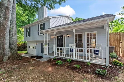 front view of a house with a garden