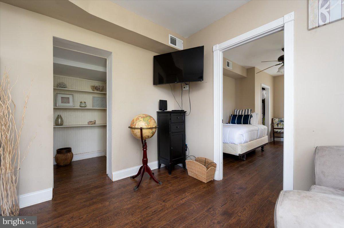 1312 Tuggies Road Pasadena, MD 21122 - Photo 31 of 75 a view of living room with furniture and a flat screen tv