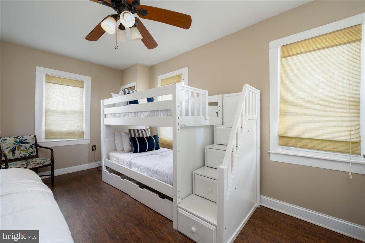 1312 Tuggies Road Pasadena, MD 21122 - Photo 33 of 75 a living room with furniture and a fireplace
