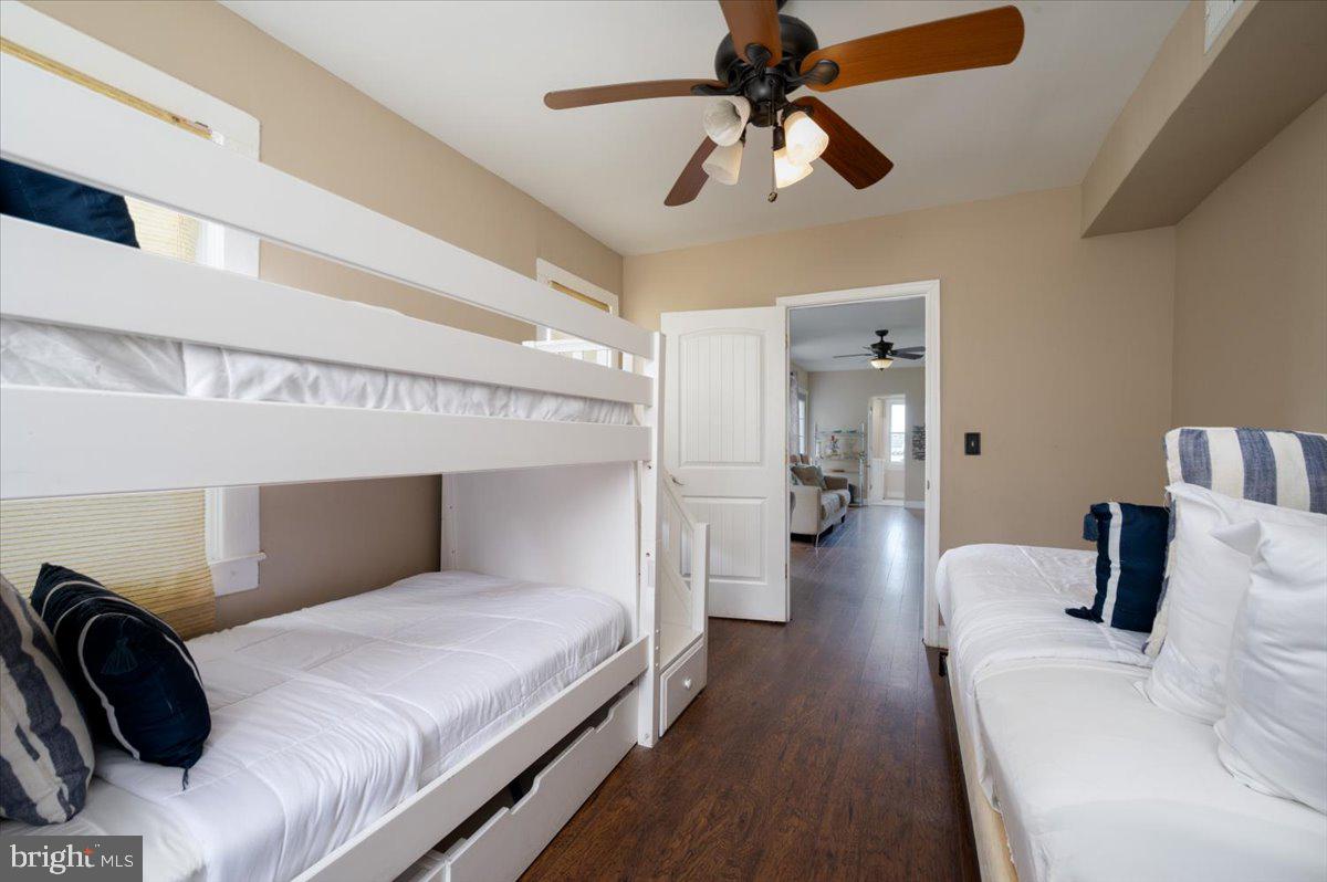 1312 Tuggies Road Pasadena, MD 21122 - Photo 34 of 75 a bedroom with a bed and walk in closet