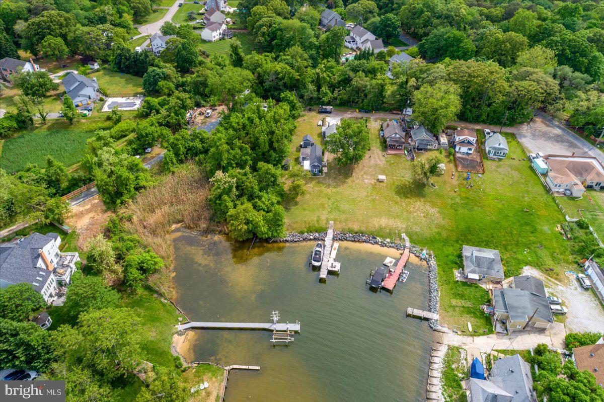 1312 Tuggies Road Pasadena, MD 21122 - Photo 55 of 75 an aerial view of residential houses with outdoor space and trees