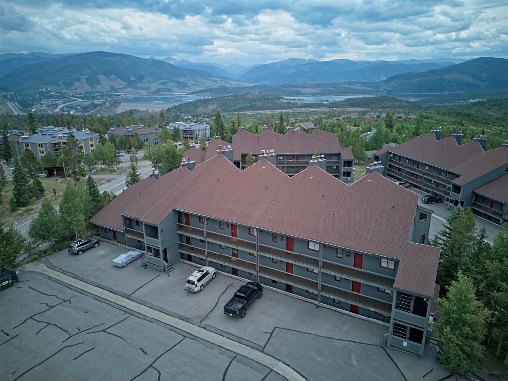 94300 Ryan Gulch Road, Unit 94302 Silverthorne, CO 80498 - Photo 31 of 33 an aerial view of a house with a yard