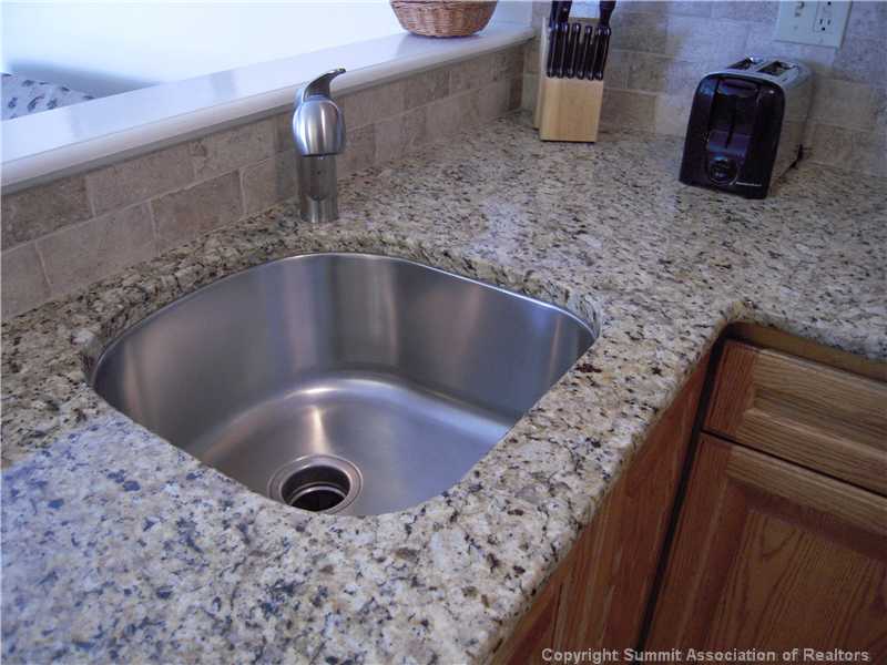 120 Sawmill Road, Unit 313 Breckenridge, CO 80424 - Photo 6 of 18 Kitchen. Great new under mount stainless sink and granite counters.