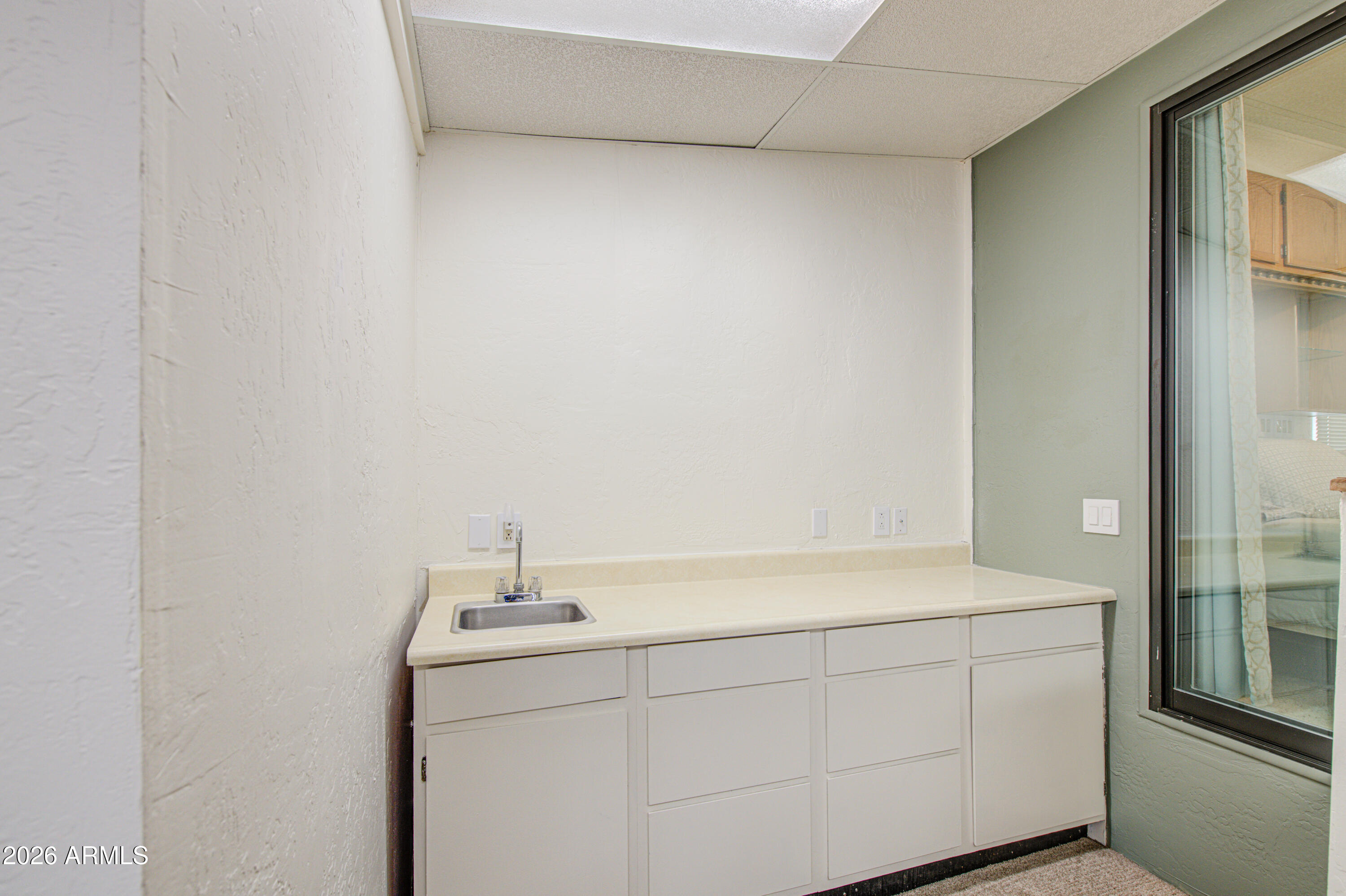 7750 East Broadway Road, Unit 480 Mesa, AZ 85208 - Photo 12 of 34 Living Room Wet Bar