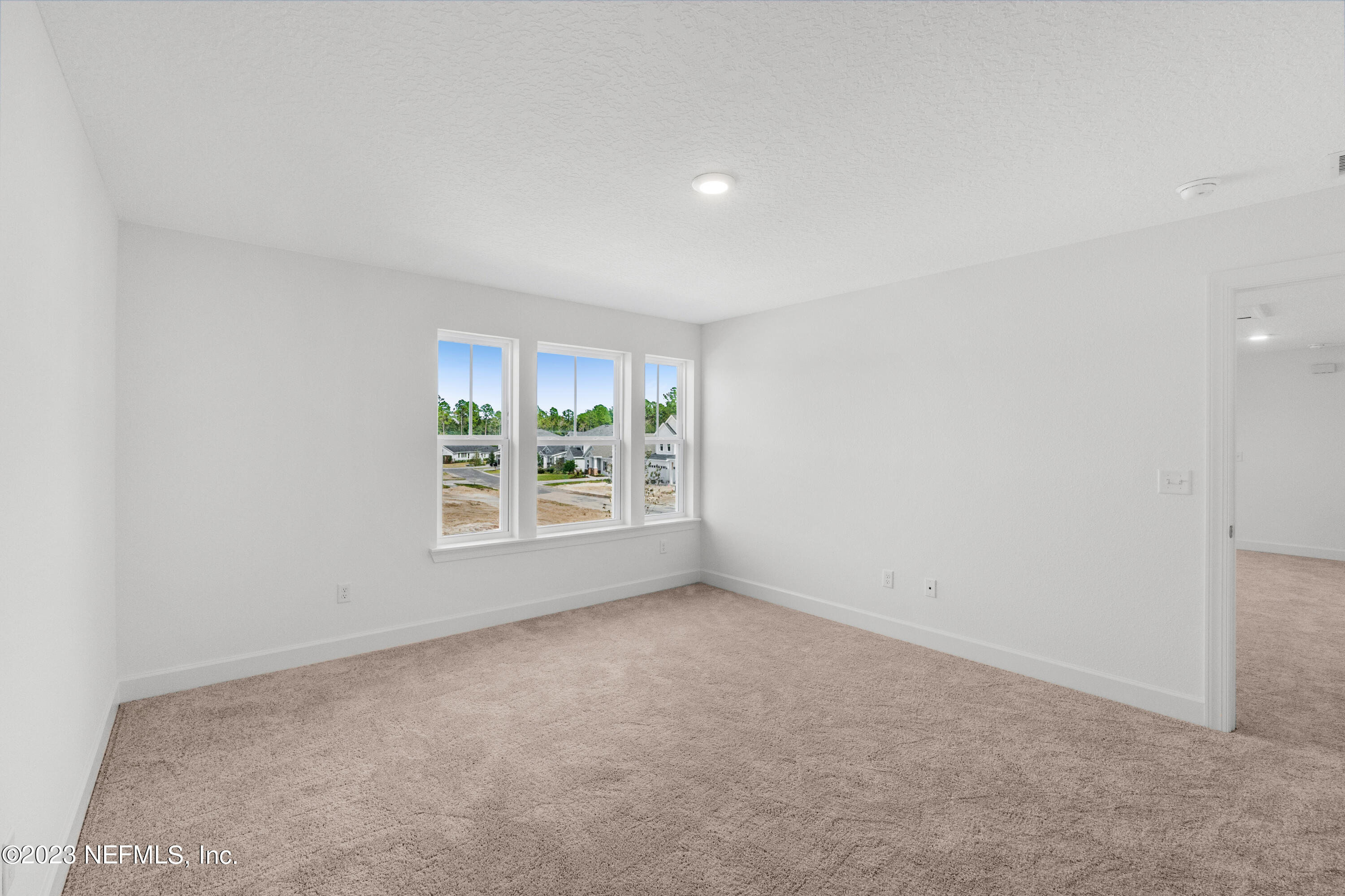 25 Shipman Court St. Augustine, FL 32092 - Photo 9 of 12 an empty room with a window