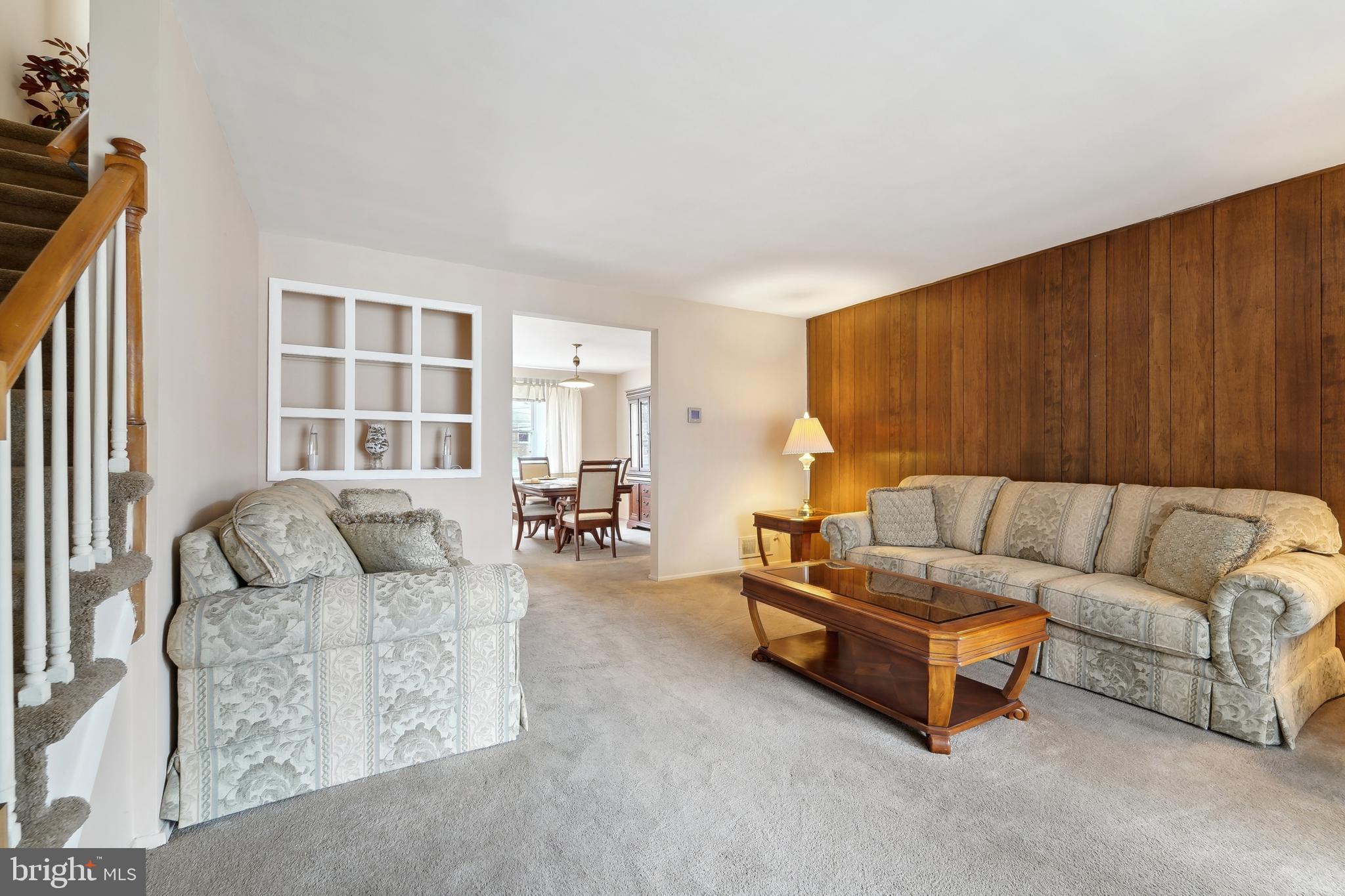 1100 Cedarcroft Road Baltimore, MD 21239 - Photo 8 of 34 a living room with furniture and a couch