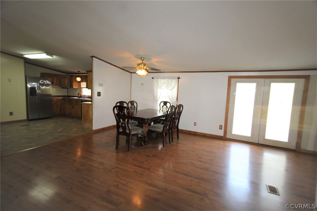802 Scotts Bottom Road Dillwyn, VA 23936 - Photo 13 of 28 a view of a dining room with furniture and wooden floor