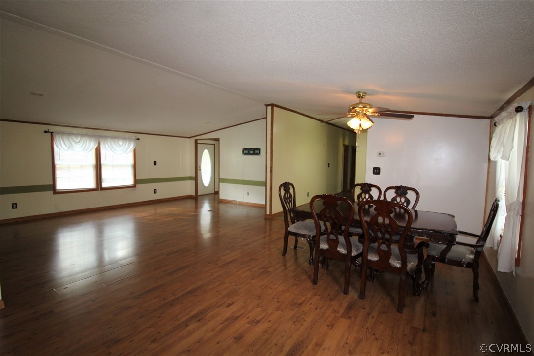 802 Scotts Bottom Road Dillwyn, VA 23936 - Photo 14 of 28 a view of a dining room with furniture and wooden floor