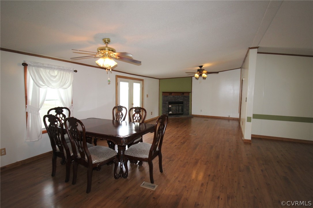802 Scotts Bottom Road Dillwyn, VA 23936 - Photo 15 of 28 a view of a a dining room with furniture window and wooden floor