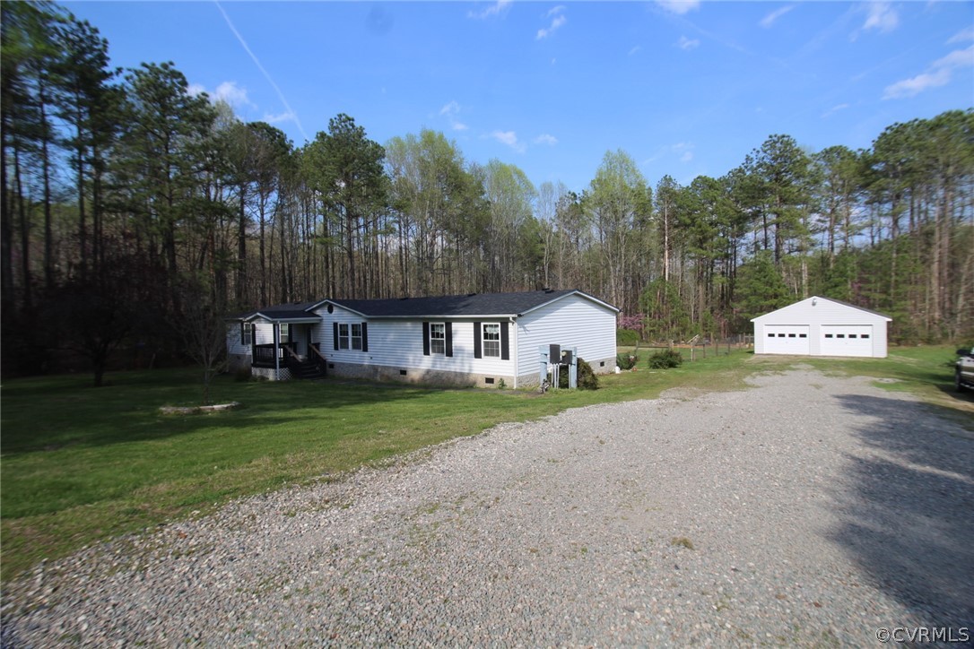 802 Scotts Bottom Road Dillwyn, VA 23936 - Photo 28 of 28 a front view of a house with garden