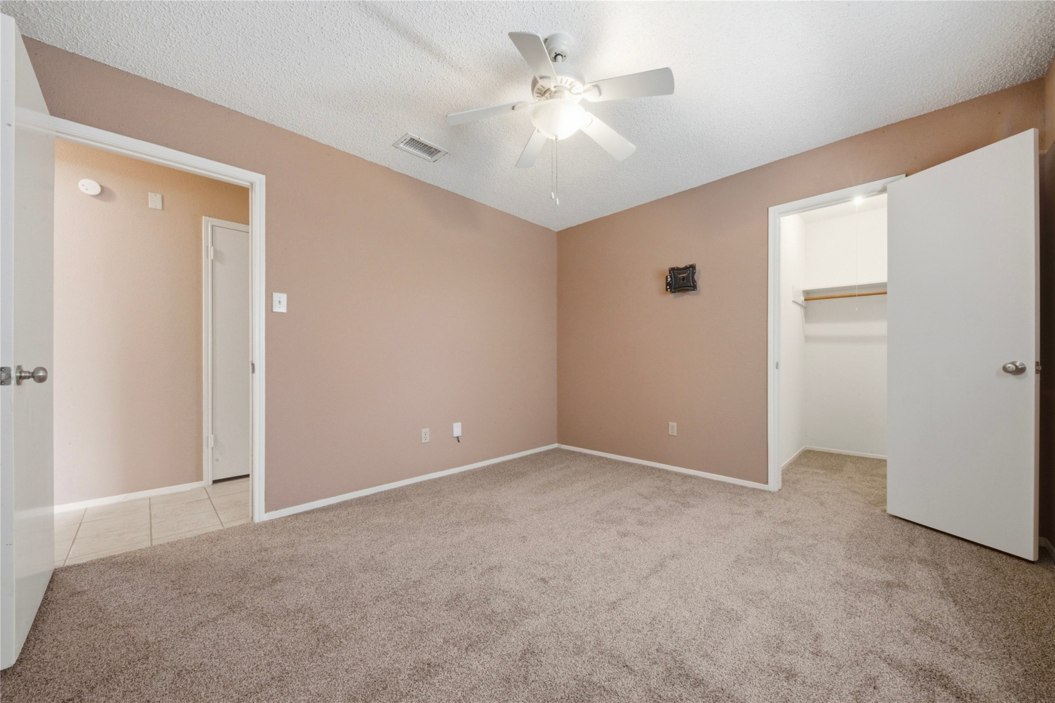 4019 Postwood Drive Spring, TX 77388 - Photo 29 of 50 a view of an empty room with a ceiling fan