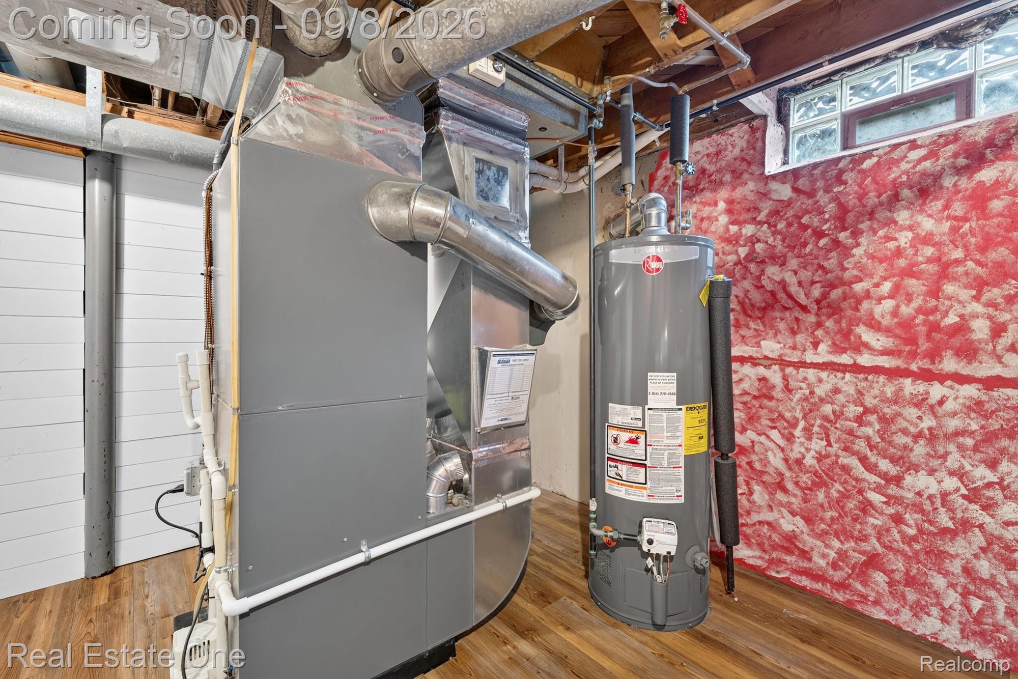7961 Merrick Street Taylor, MI 48180 - Photo 27 of 39 Wood-finish flooring with a water heater and furnace