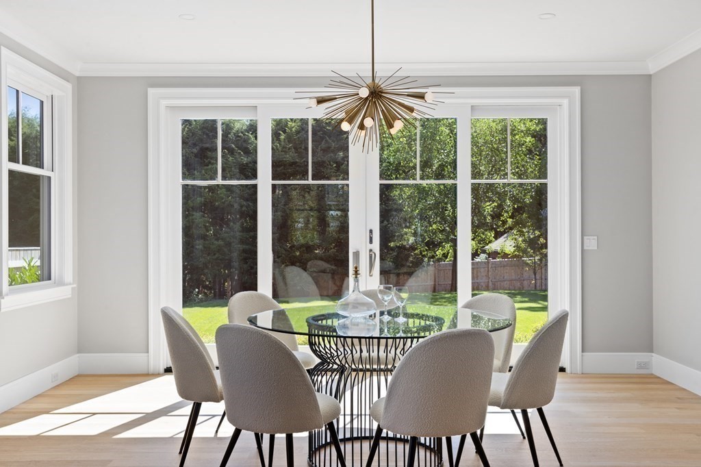 12 Owaisa Road Newton, MA 02468 - Photo 14 of 33 a view of a dining room with furniture window and outside view
