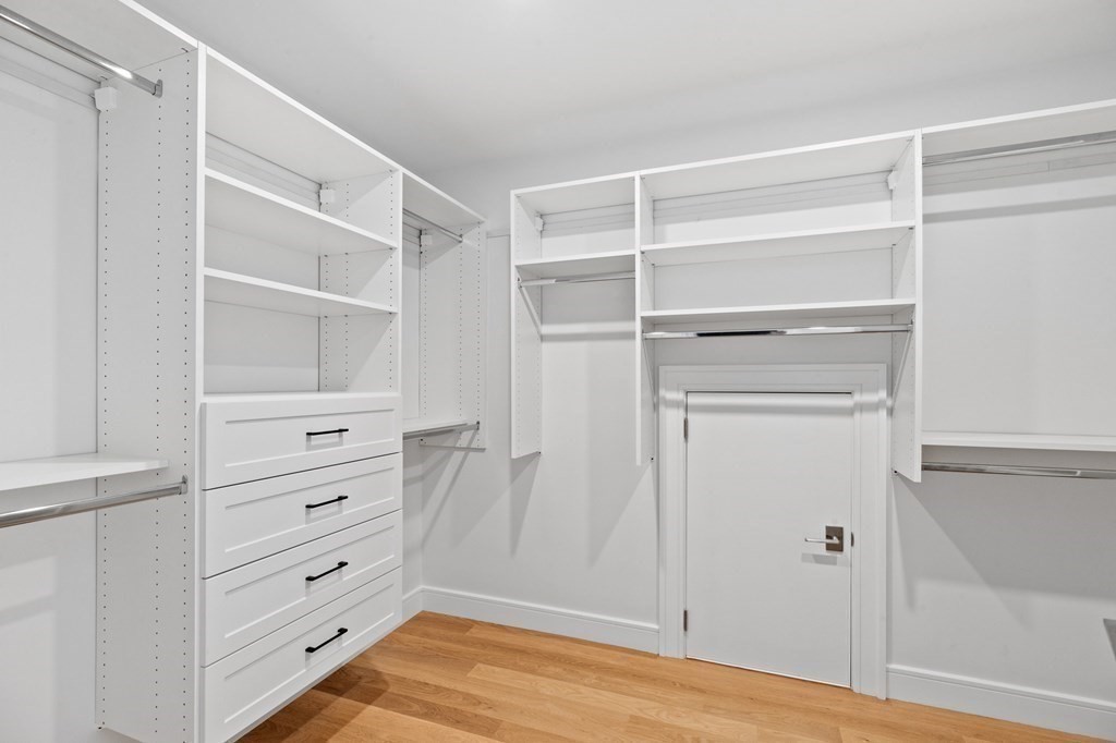 12 Owaisa Road Newton, MA 02468 - Photo 24 of 33 a view of walk in closet with empty racks