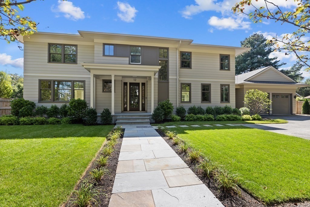 12 Owaisa Road Newton, MA 02468 - Photo 3 of 33 a front view of a house with garden