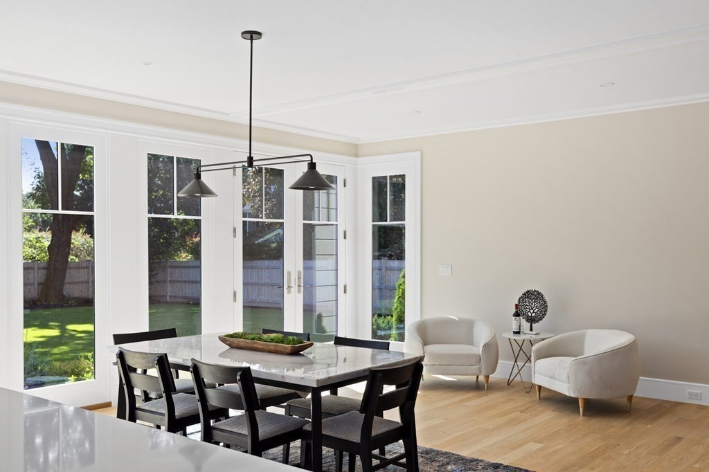 12 Owaisa Road Newton, MA 02468 - Photo 9 of 33 a view of a dining room with furniture window and outside view