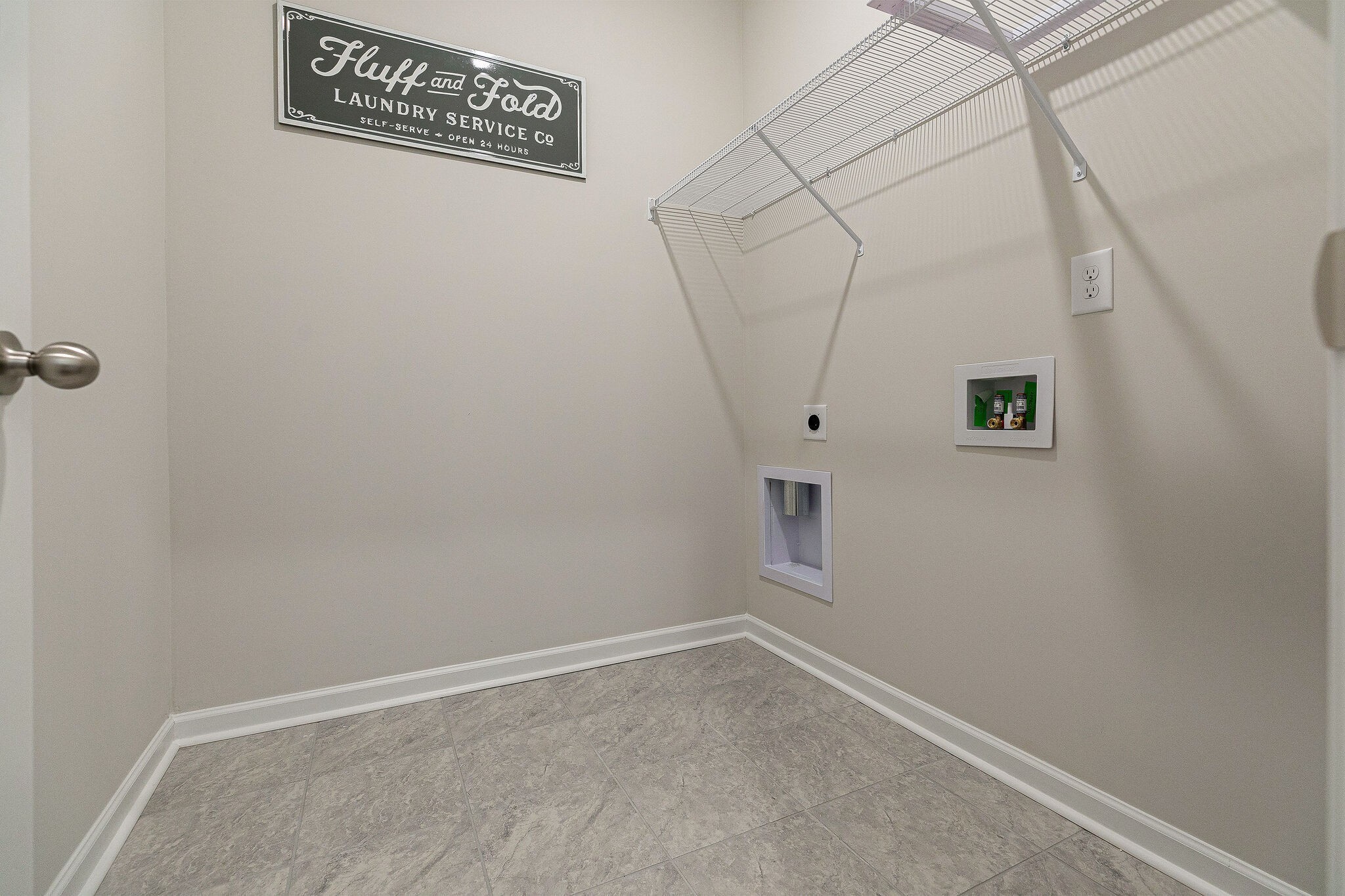 1056 June Wilde Ridge Spring Hill, TN 37174 - Photo 18 of 29 a view of a room with racks on the wall