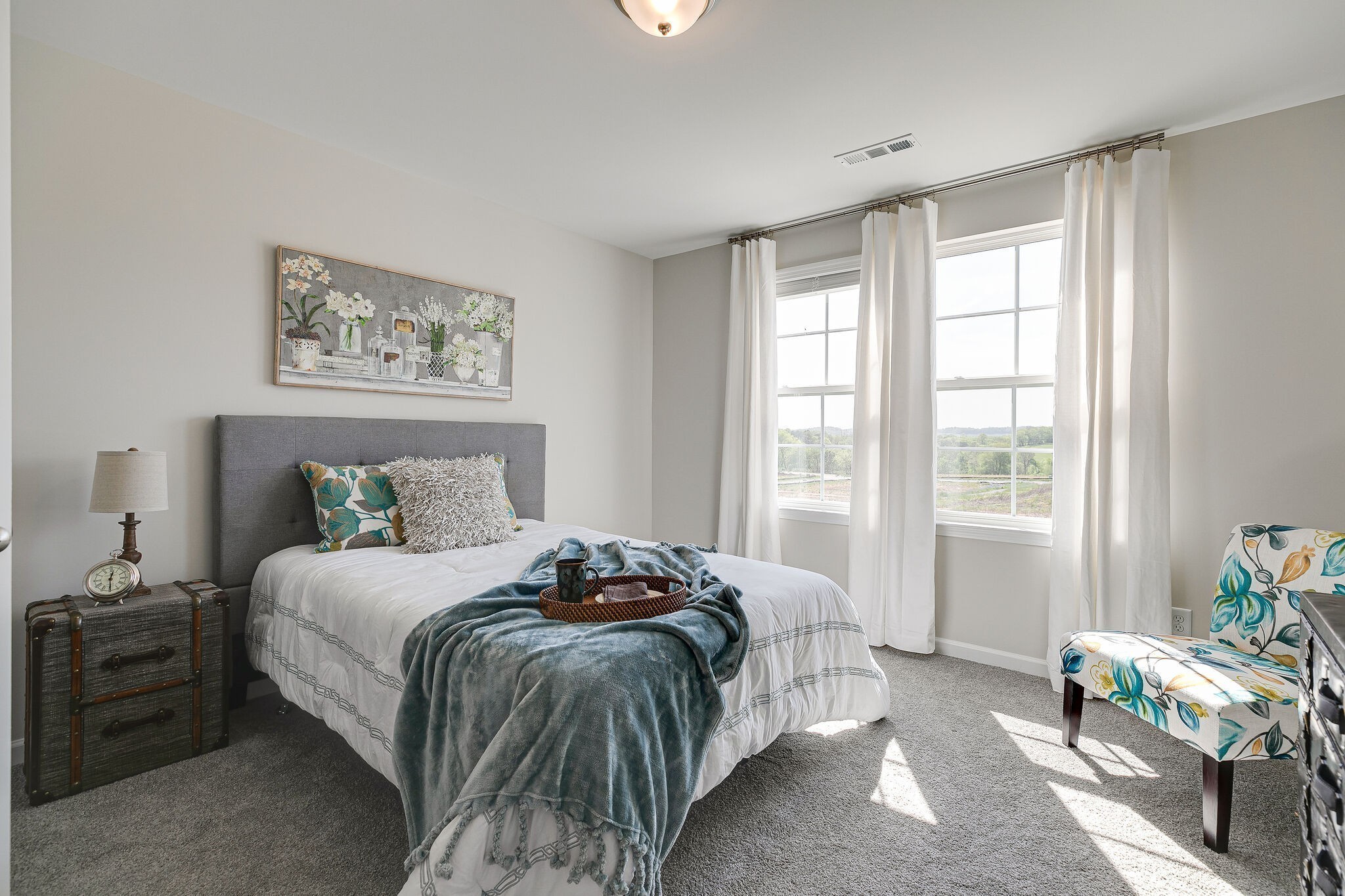 1056 June Wilde Ridge Spring Hill, TN 37174 - Photo 23 of 29 a bedroom with a bed painting on wall and a large window