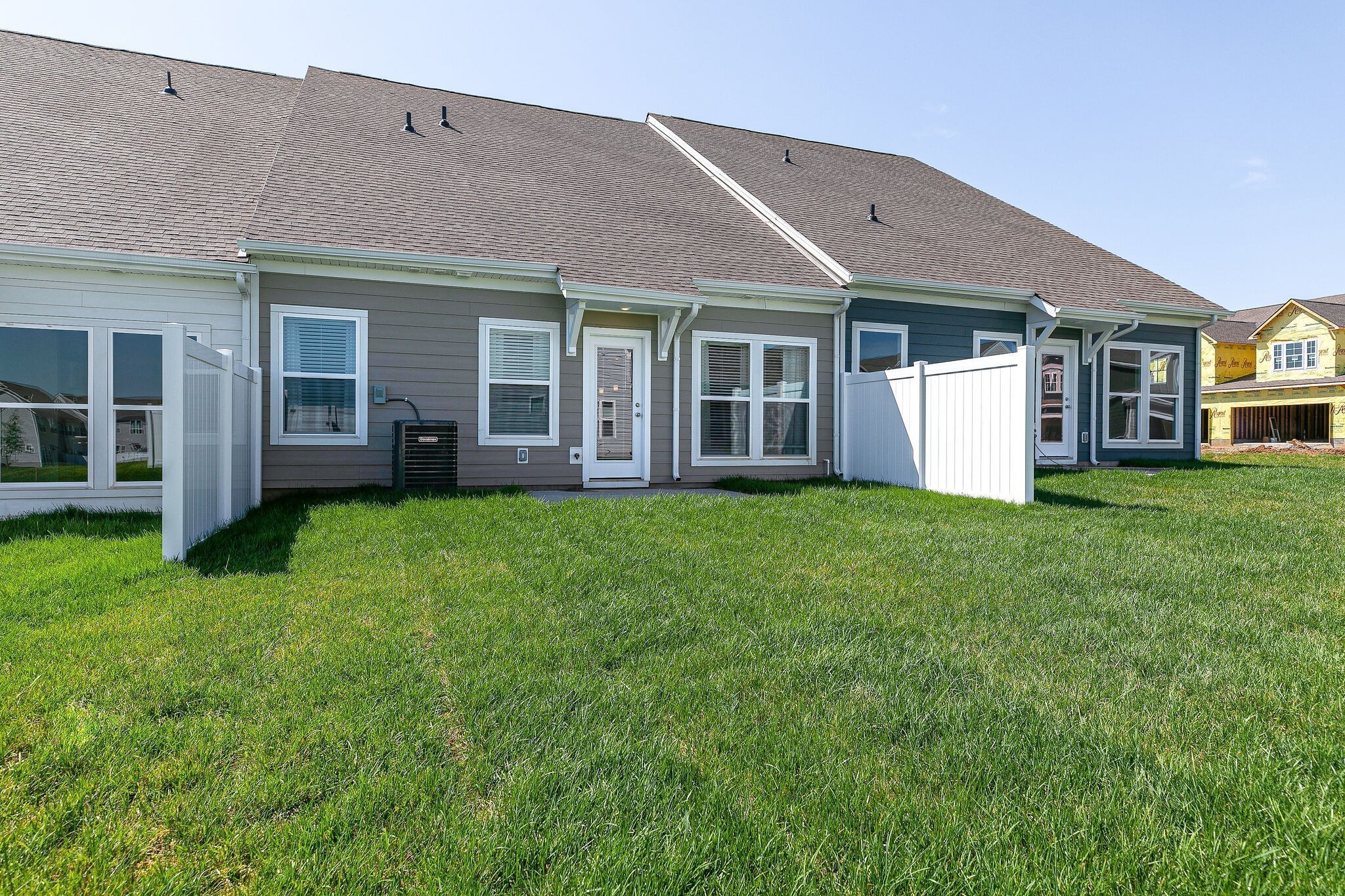 1056 June Wilde Ridge Spring Hill, TN 37174 - Photo 26 of 29 a view of a house with a yard and sitting area