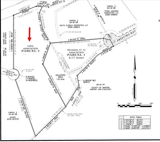 a picture of a room with a white wall and a large window