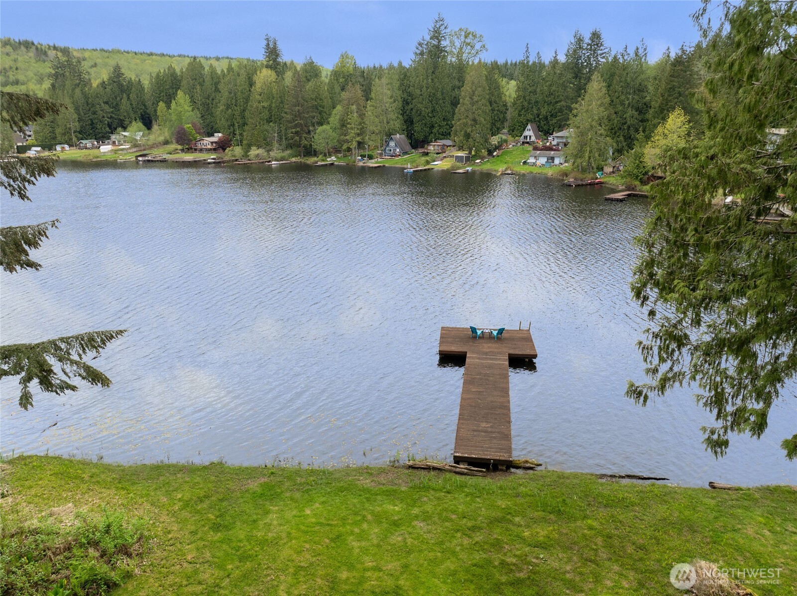 1028 South Lake Roesiger Road Snohomish, WA 98290 - Photo 2 of 38 an aerial view of a house with a yard and lake view