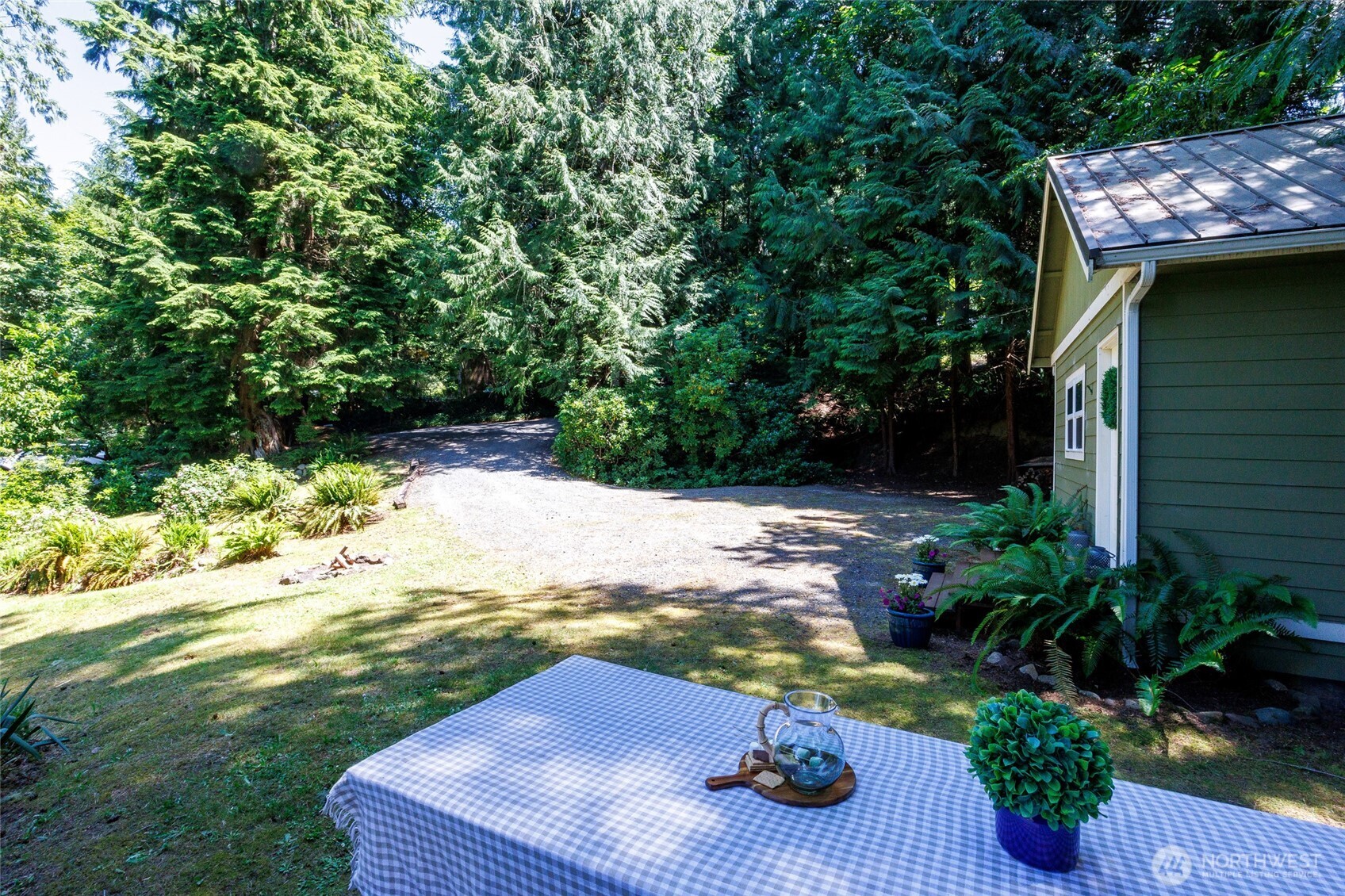 1028 South Lake Roesiger Road Snohomish, WA 98290 - Photo 35 of 38 a view of backyard with seating space
