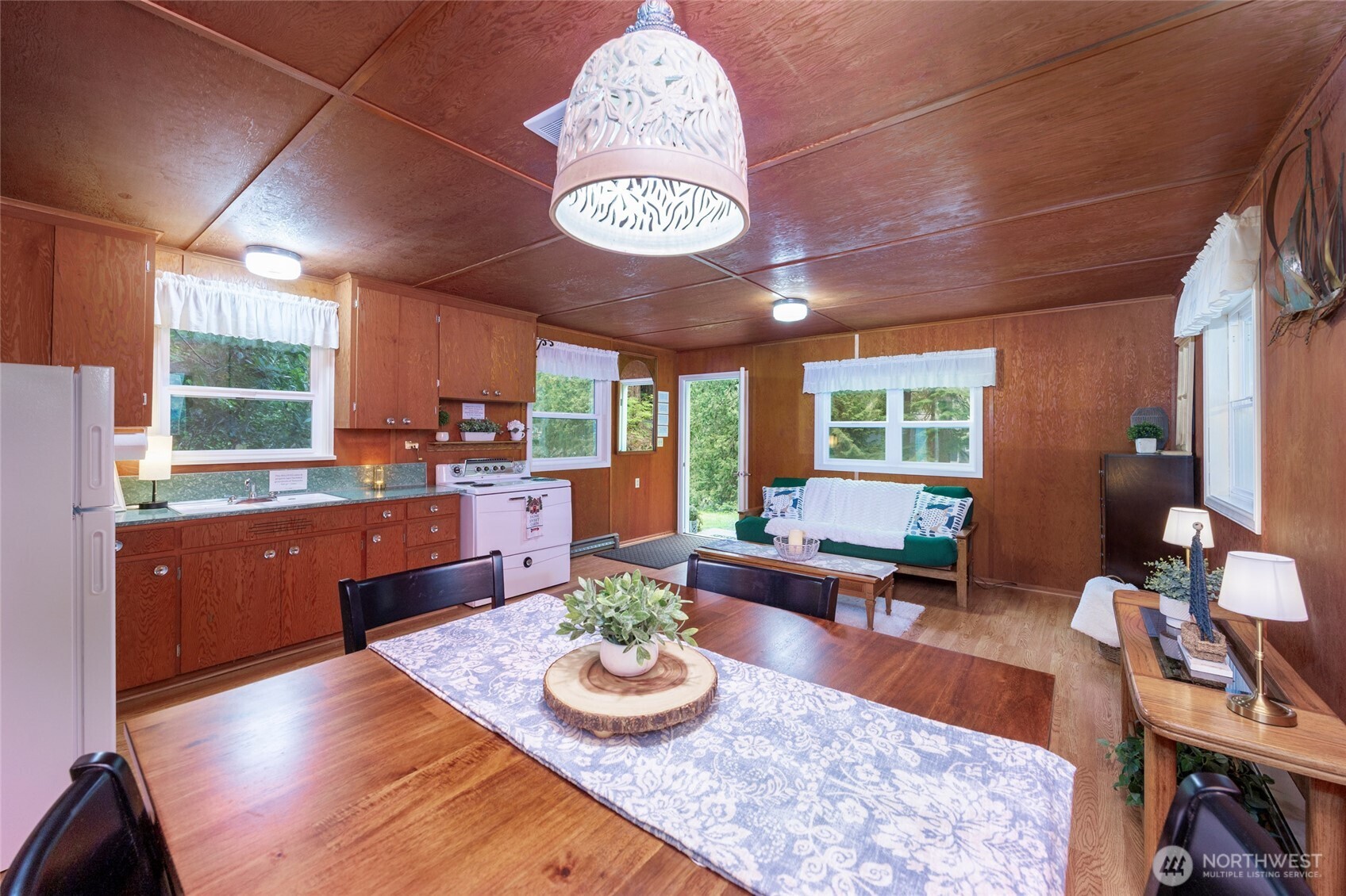 1028 South Lake Roesiger Road Snohomish, WA 98290 - Photo 9 of 38 a kitchen with a table and chairs in it