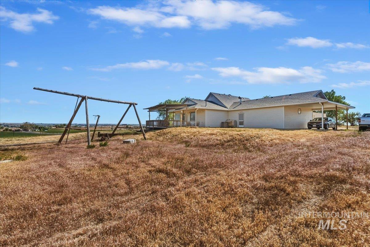 2331 Gulley Road Homedale, ID 83628 - Photo 37 of 46 Single-story residence featuring a covered patio, attached carport, and a pitched roofline