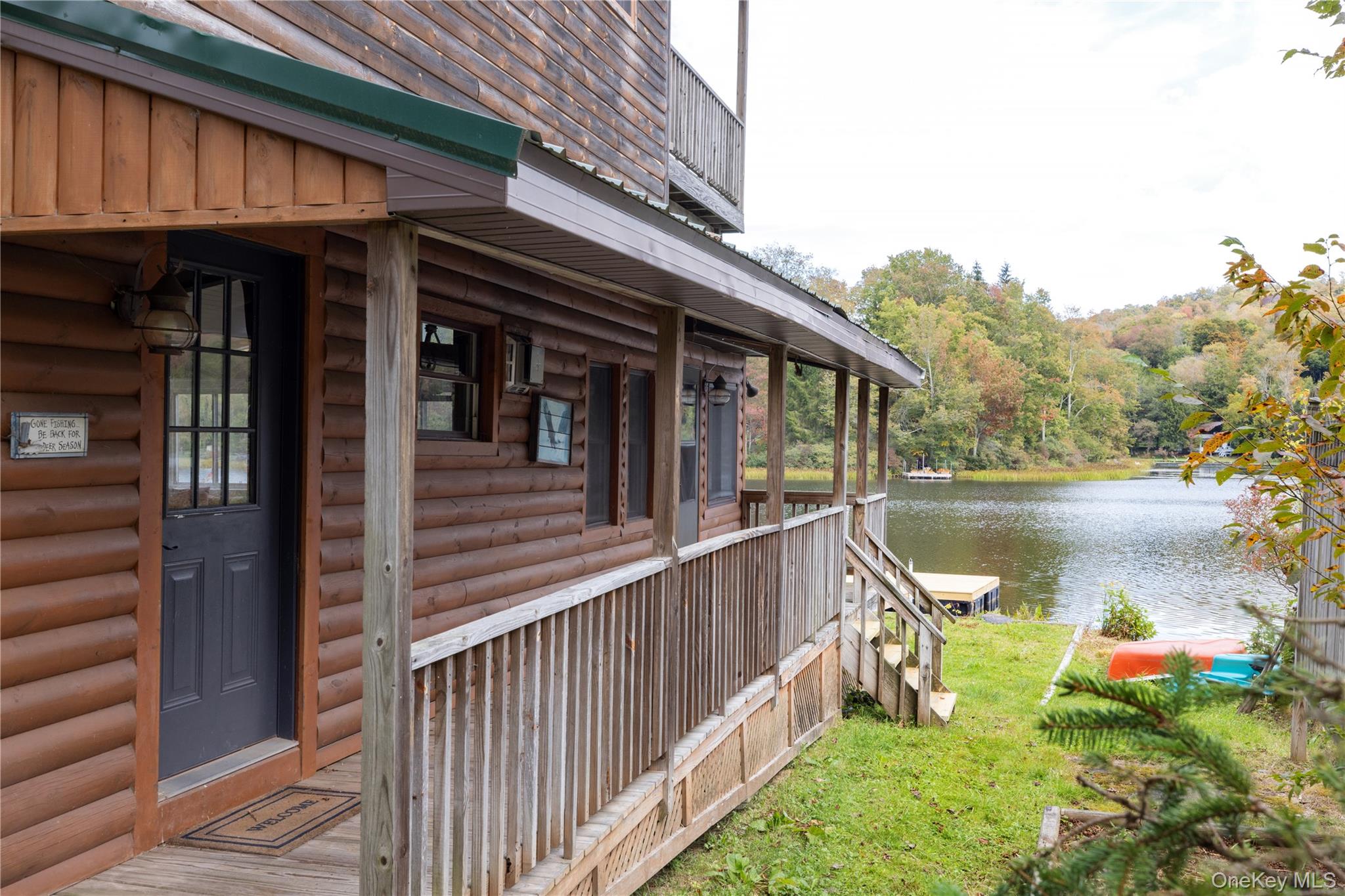 212 Trout Brook Road Roscoe, NY 12776 - Photo 9 of 29 a view of a house with backyard and lake view