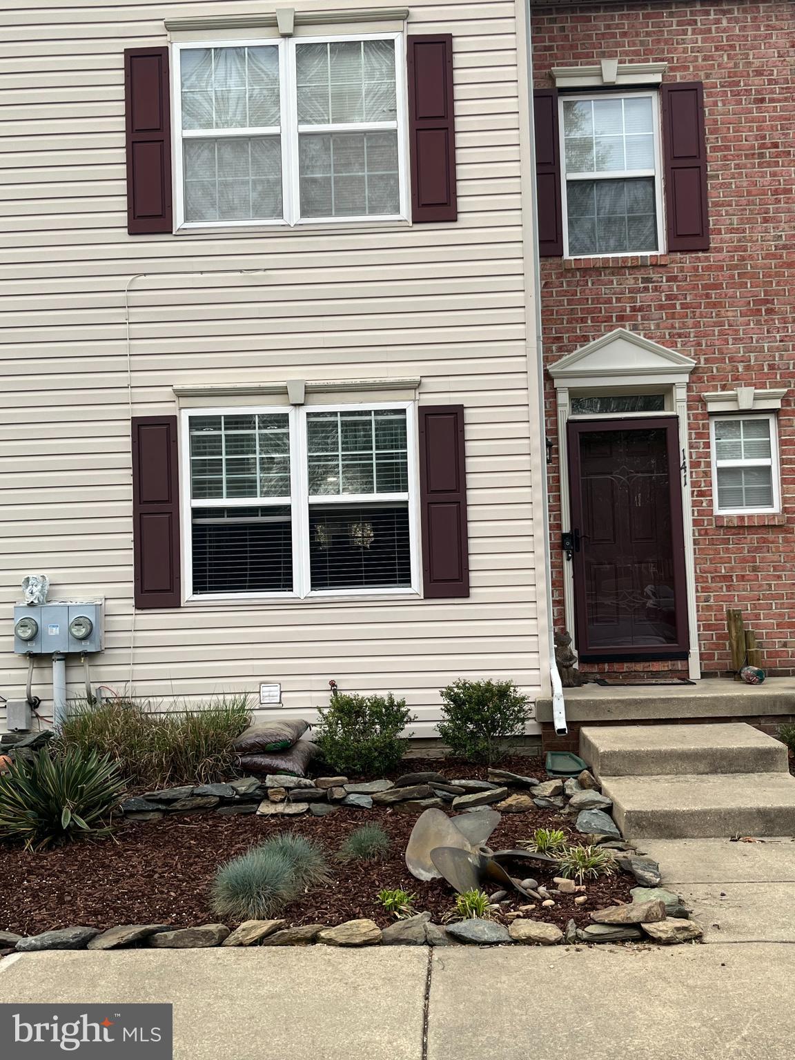 141 Winslow Place Prince Frederick, MD 20678 - Photo 2 of 6 a front view of a house