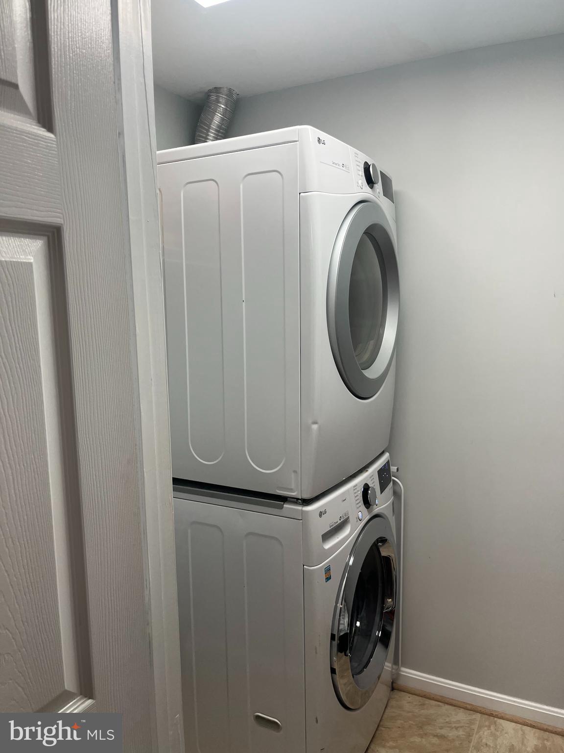 141 Winslow Place Prince Frederick, MD 20678 - Photo 3 of 6 a utility room with dryer and washer