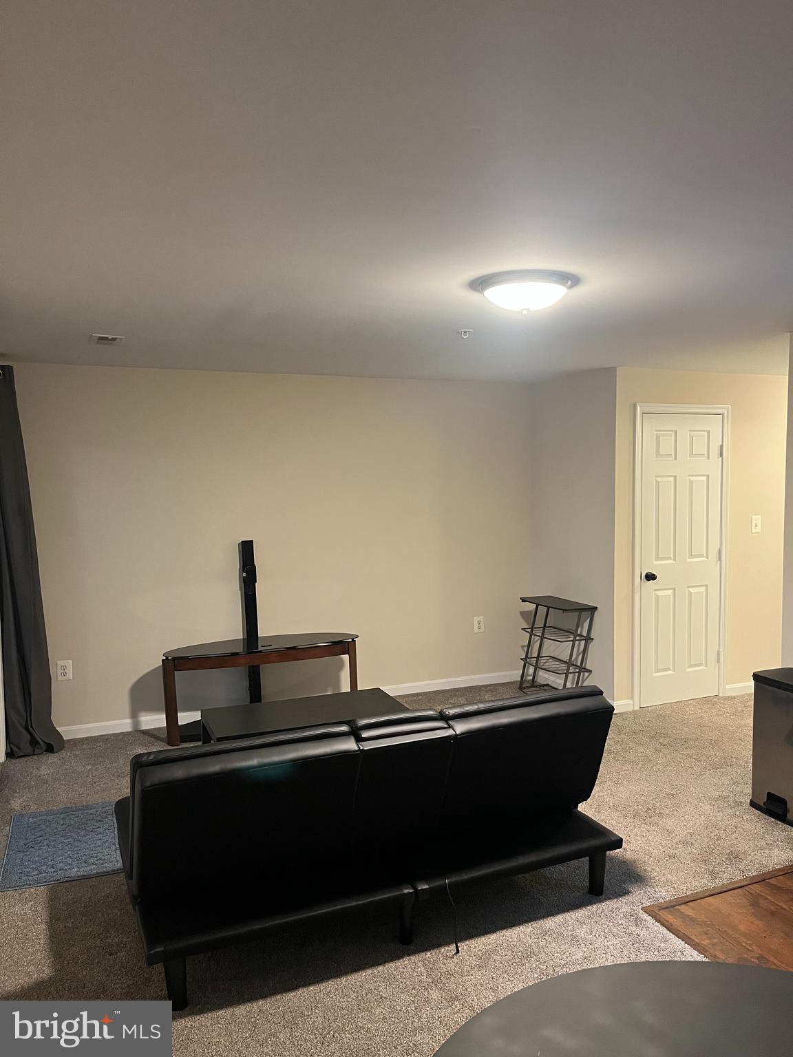 141 Winslow Place Prince Frederick, MD 20678 - Photo 4 of 6 a living room with furniture