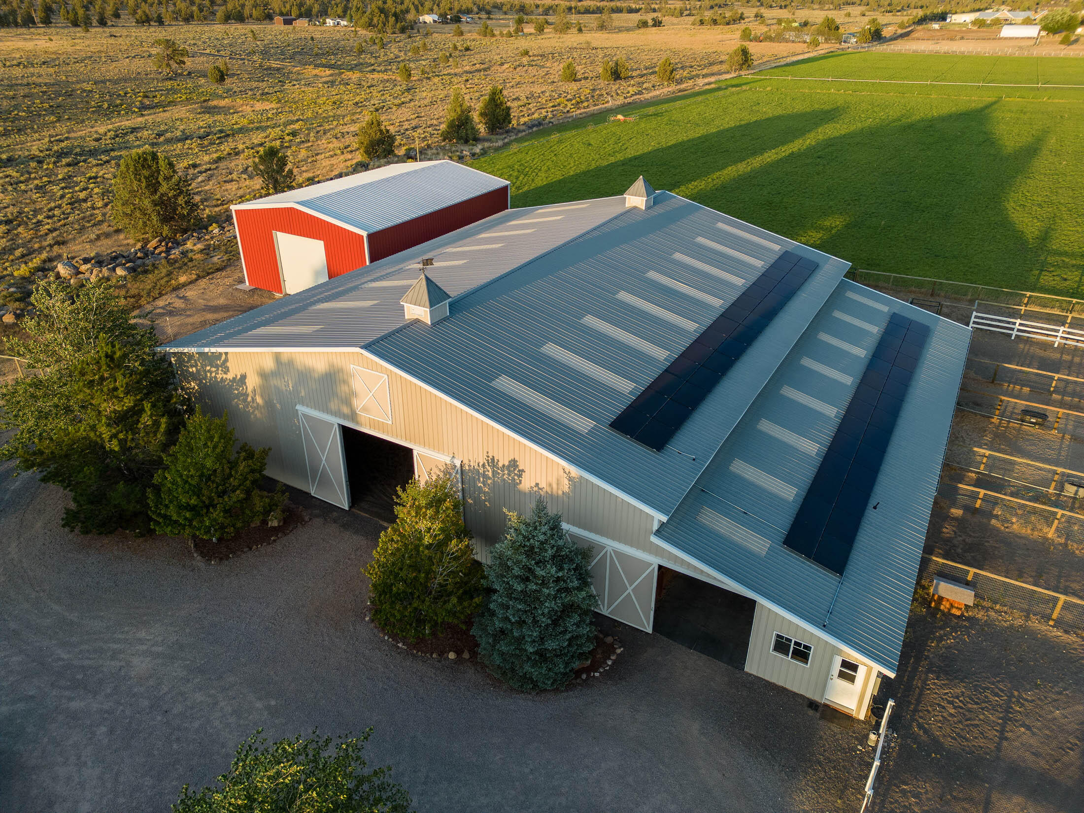 66290 Cline Falls Road Bend, OR 97703 - Photo 49 of 59 Please note the owned solar panels on south roof of the barn.