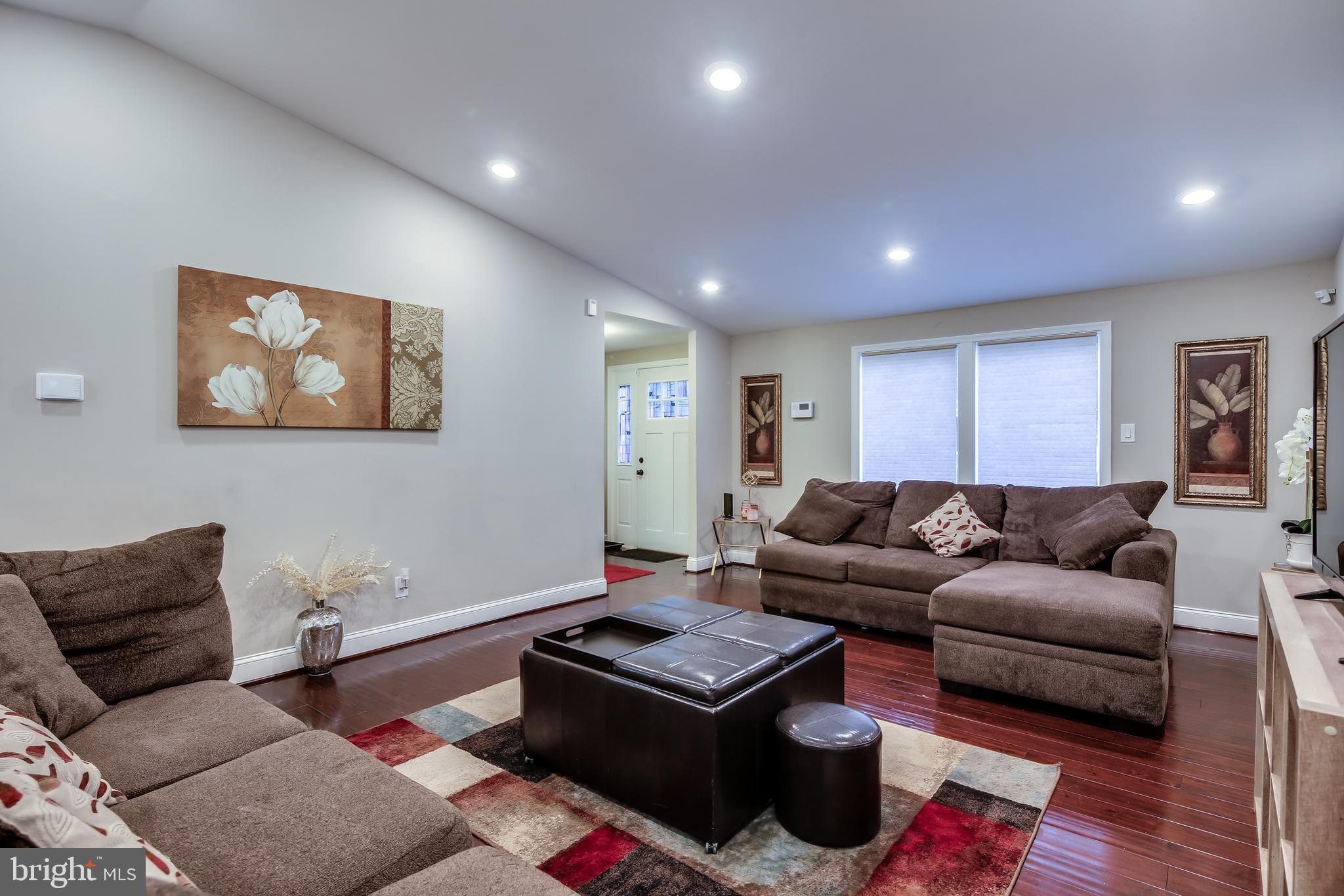9846 Branchleigh Road Randallstown, MD 21133 - Photo 4 of 32 Foyer & Living Room w/ Vaulted Ceiling