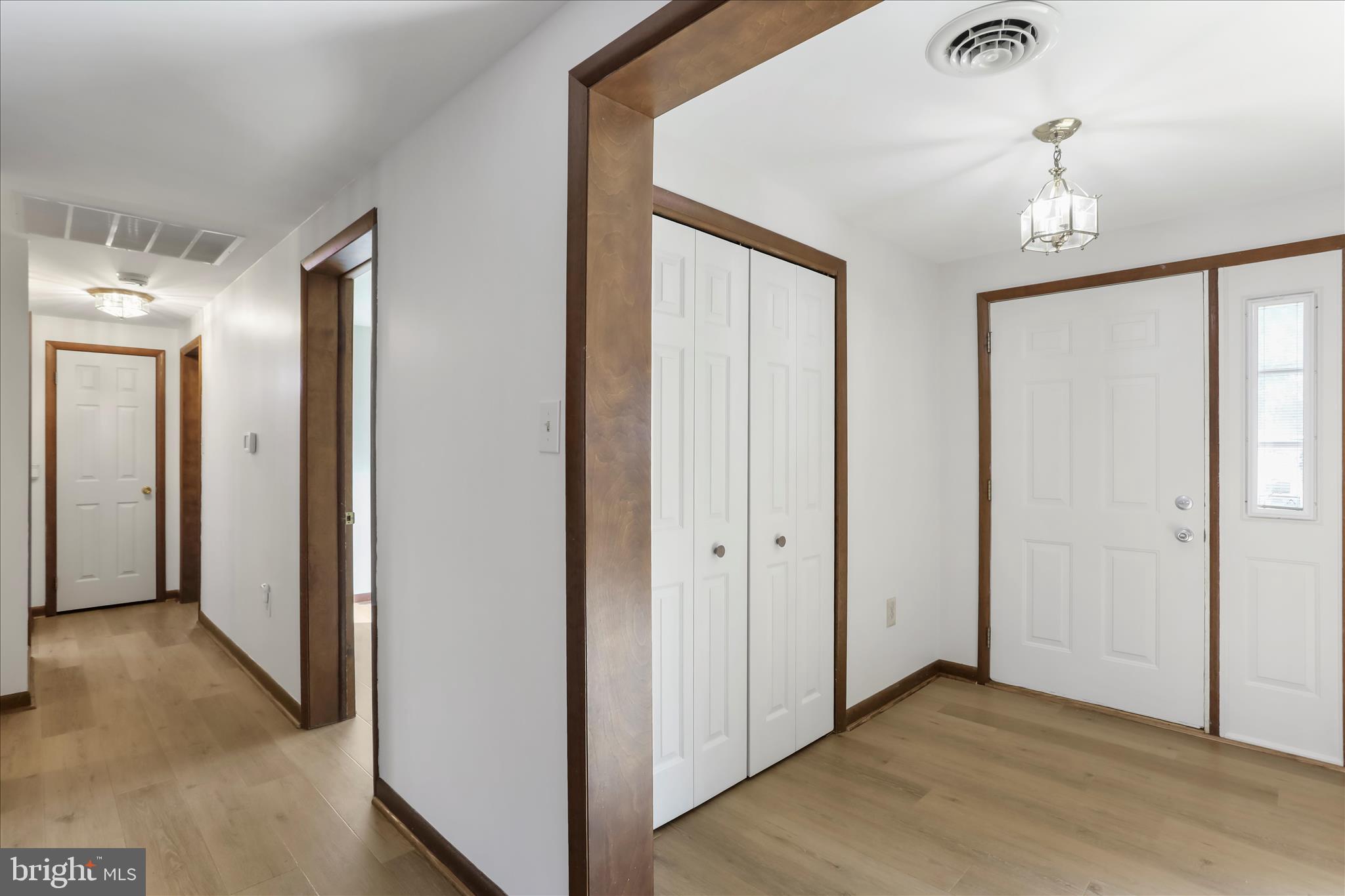 24744 Raven Rock Road Smithsburg, MD 21783 - Photo 15 of 49 a view of a hallway with wooden floor