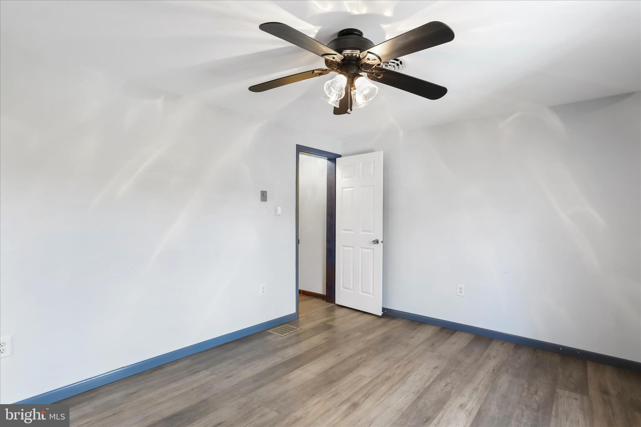 24744 Raven Rock Road Smithsburg, MD 21783 - Photo 20 of 49 wooden floor in an empty room
