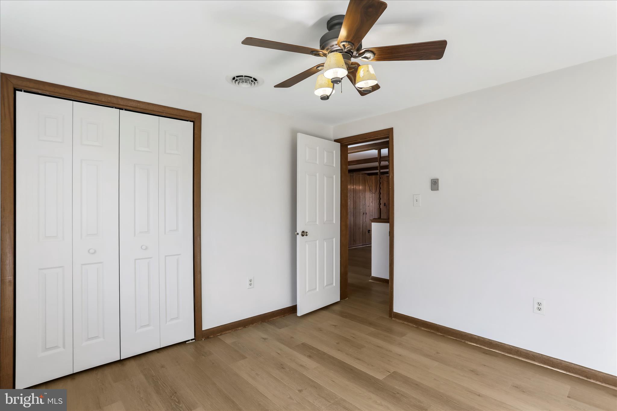 24744 Raven Rock Road Smithsburg, MD 21783 - Photo 25 of 49 wooden floor in an empty room with a window