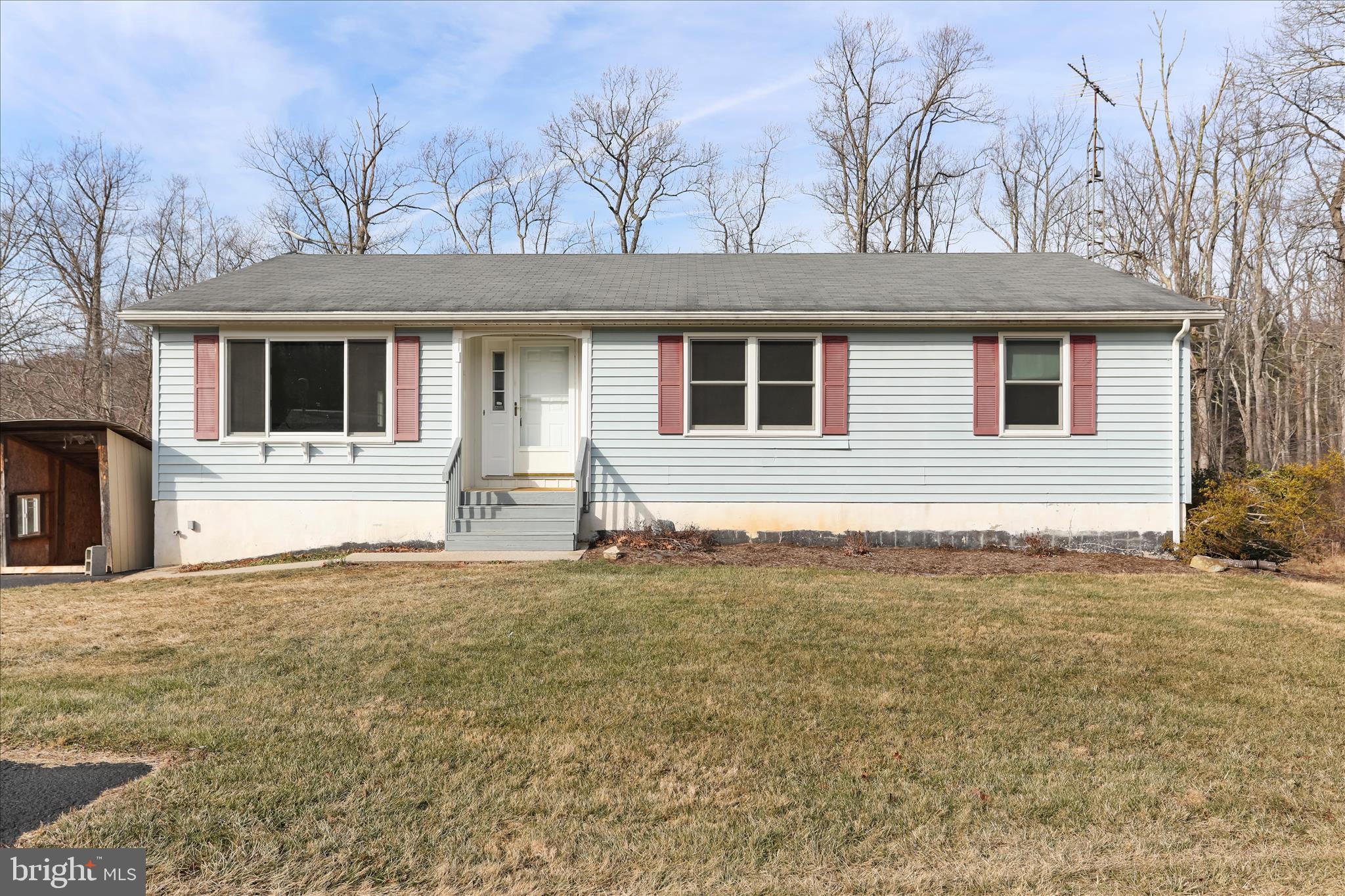 24744 Raven Rock Road Smithsburg, MD 21783 - Photo 4 of 49 front view of a house with a yard