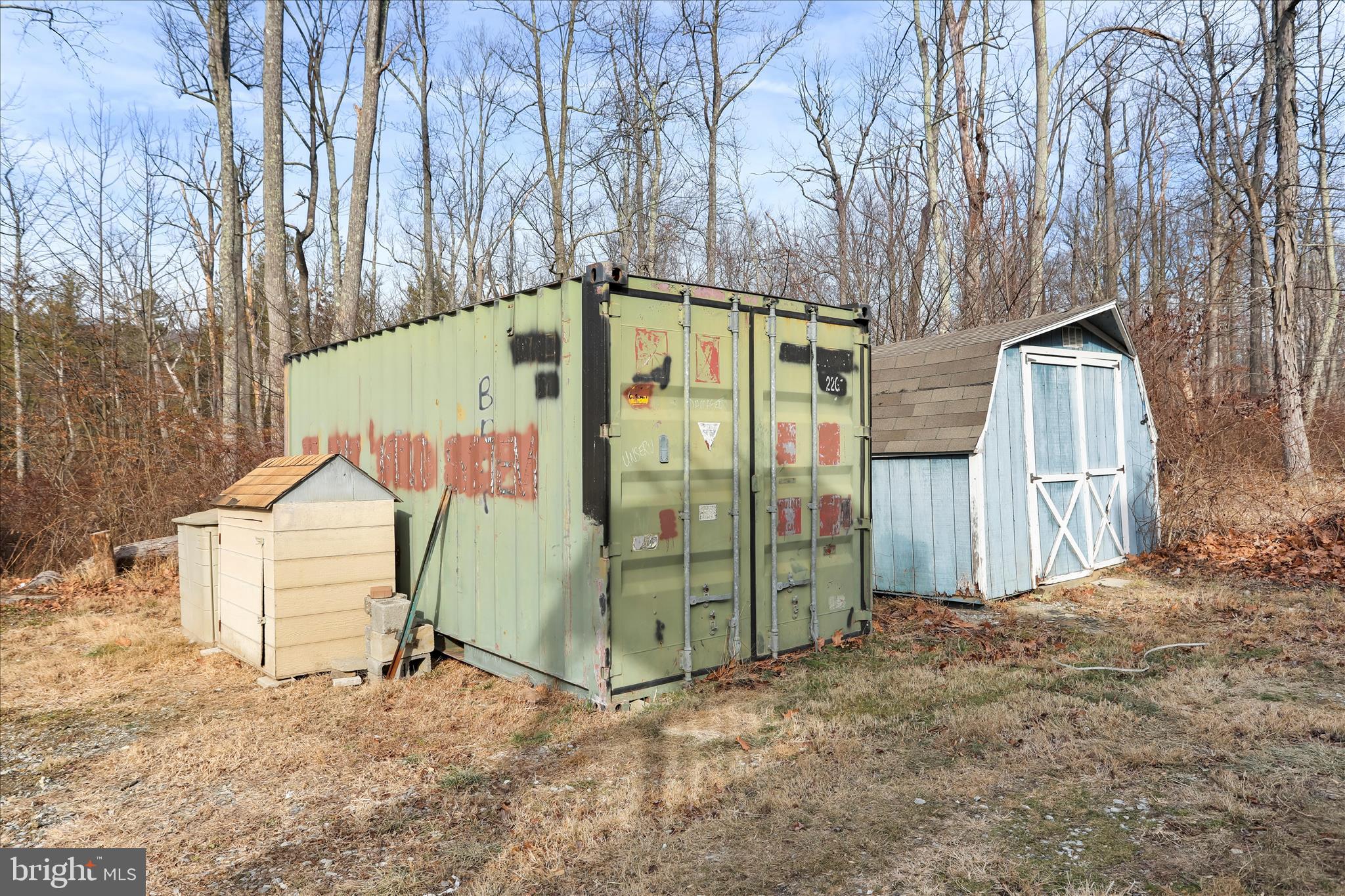 24744 Raven Rock Road Smithsburg, MD 21783 - Photo 47 of 49 a view of a tiny house with a yard and large trees