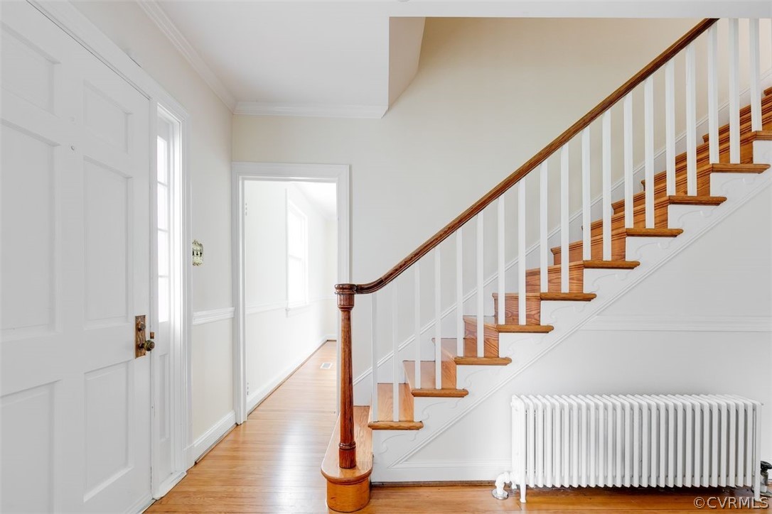 4801 Coleman Road Richmond, VA 23230 - Photo 11 of 42 Step inside the welcoming foyer to discover gorgeous refinished hardwoods throughout the whole house.
