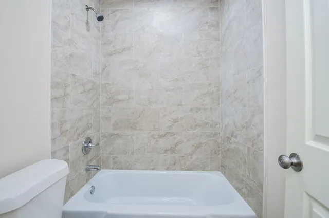 a bathroom with a bathtub