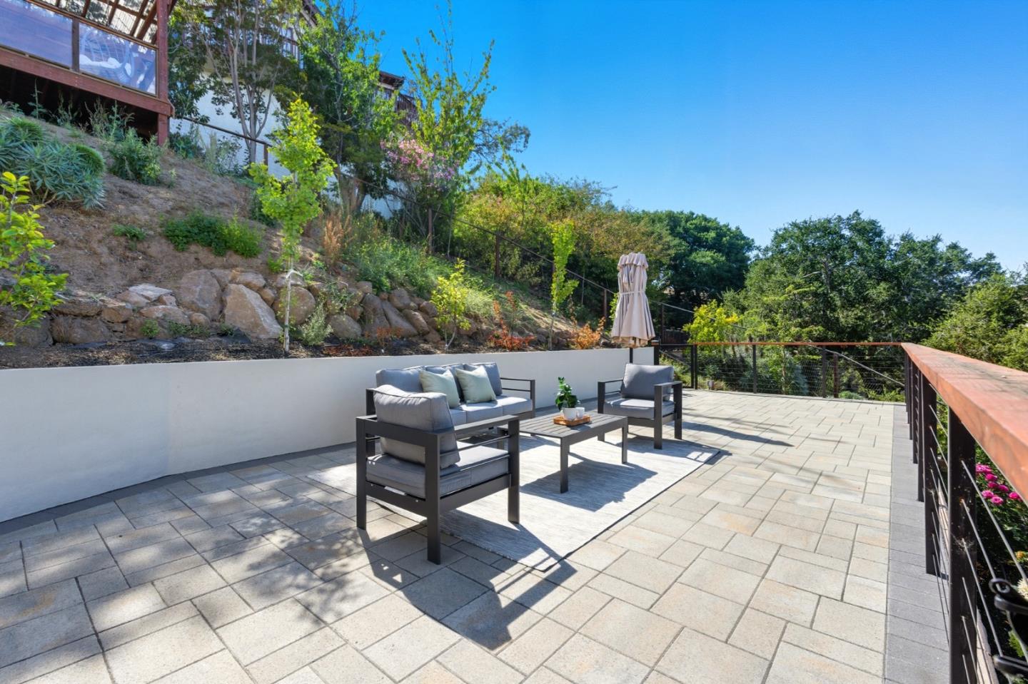 1 Lewis Ranch Road San Carlos, CA 94070 - Photo 105 of 111 a view of backyard with a table and chairs