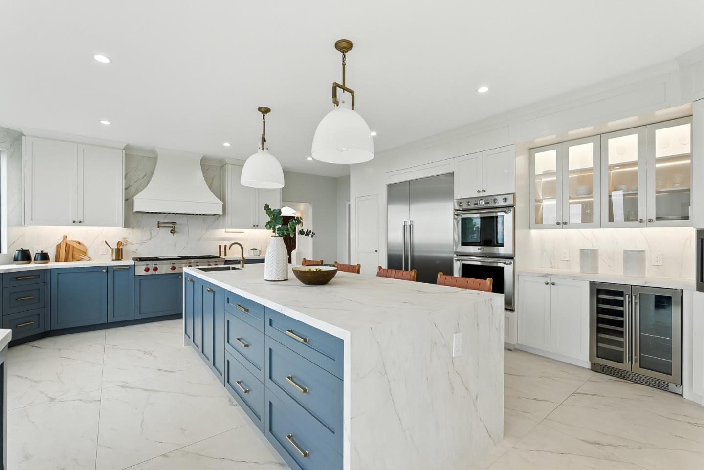 1 Lewis Ranch Road San Carlos, CA 94070 - Photo 11 of 111 a large kitchen with kitchen island granite countertop a stove top oven a sink a dining table and chairs