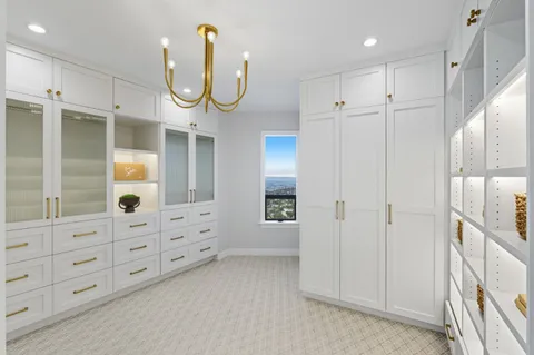 a view of a storage & utility room with washer and dryer