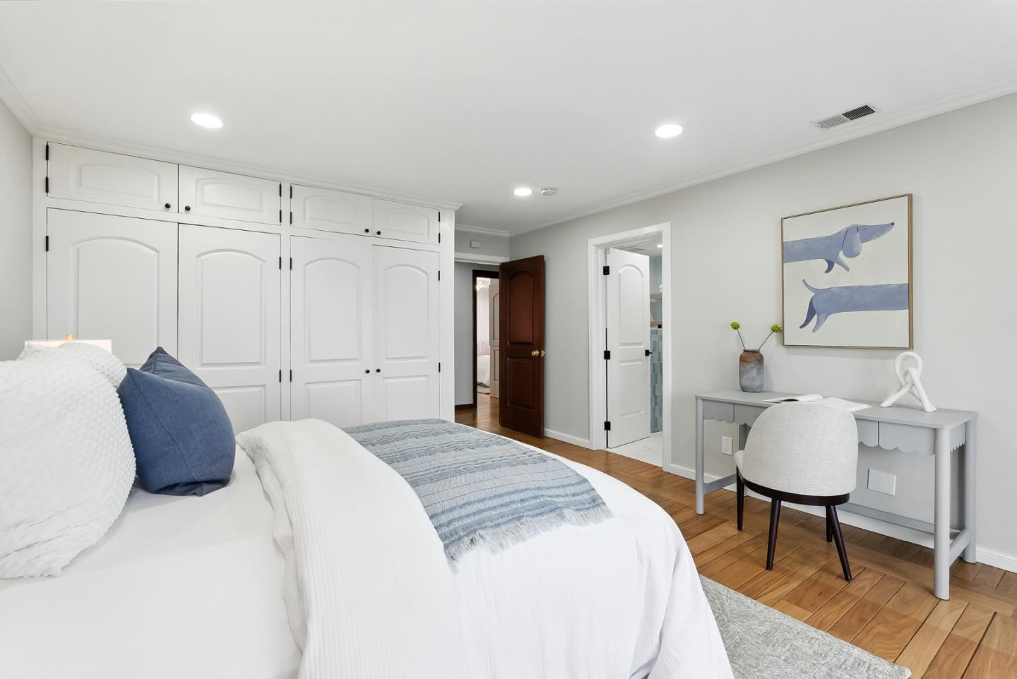 1 Lewis Ranch Road San Carlos, CA 94070 - Photo 38 of 111 a spacious bedroom with a bed and a chandelier