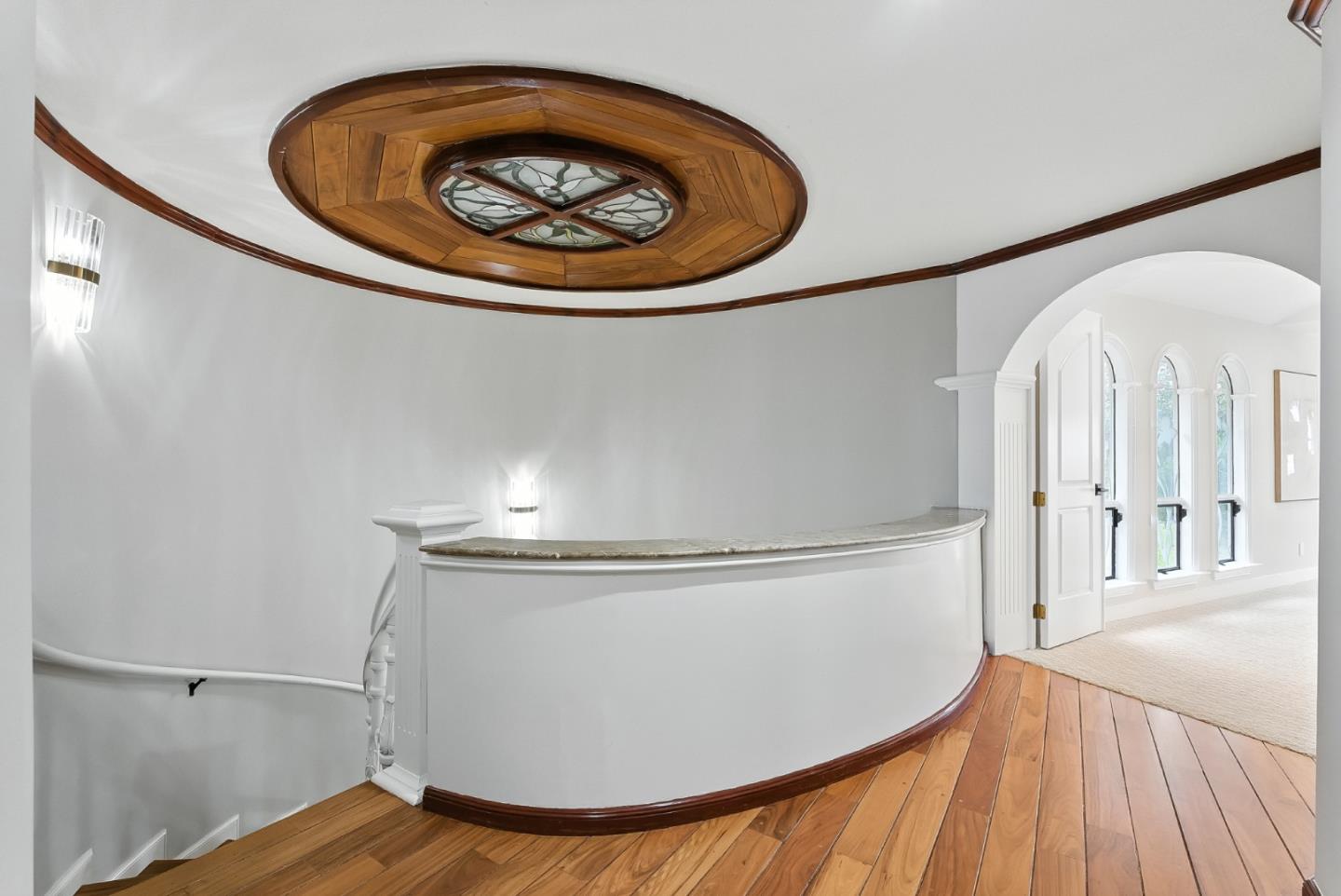 1 Lewis Ranch Road San Carlos, CA 94070 - Photo 47 of 111 a view of a hallway with wooden floor