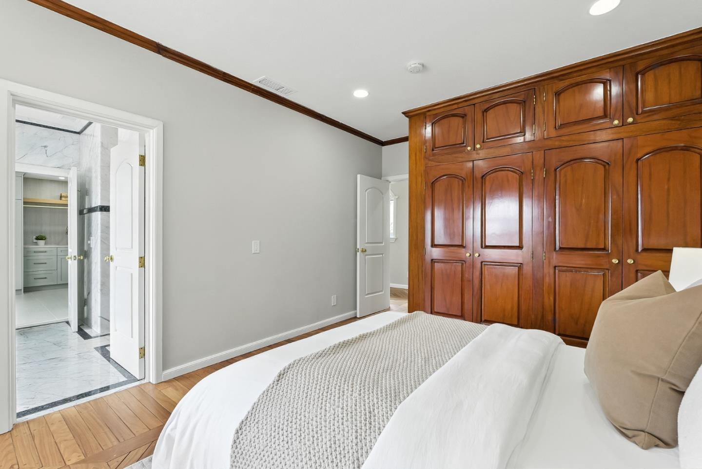 1 Lewis Ranch Road San Carlos, CA 94070 - Photo 75 of 111 a bedroom with a bed and wooden floor