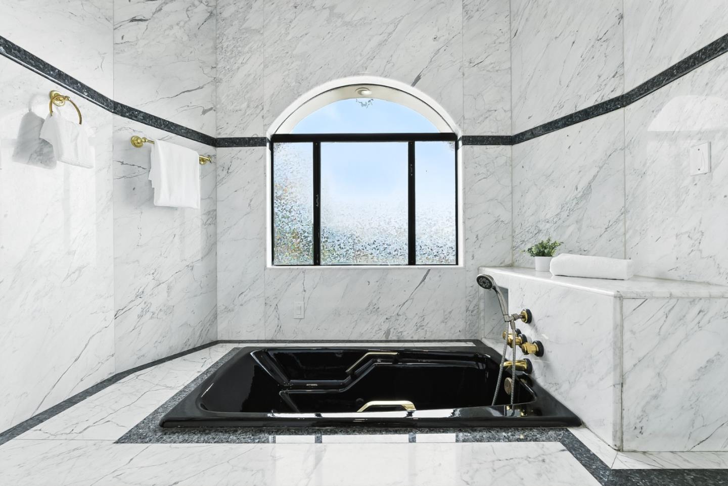 1 Lewis Ranch Road San Carlos, CA 94070 - Photo 77 of 111 a bathroom with a granite countertop sink and a bathtub