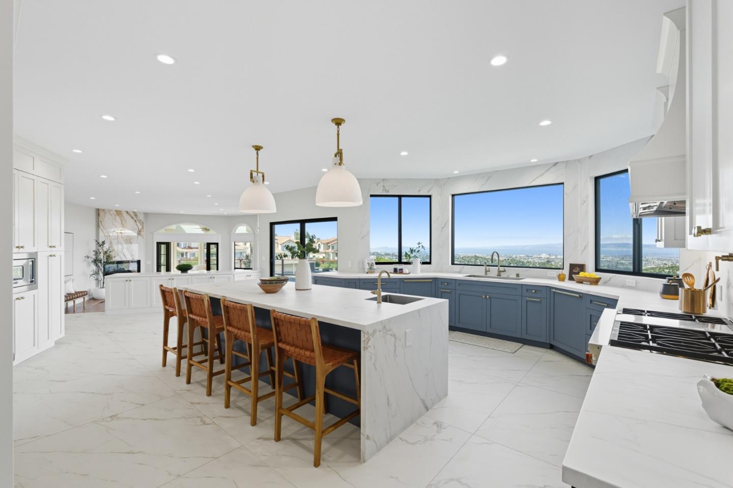 1 Lewis Ranch Road San Carlos, CA 94070 - Photo 8 of 111 a view of kitchen with kitchen island stainless steel appliances sink refrigerator dining table and chairs